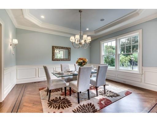 15 Fulton Road Lexington, MA 02420 - Photo 8 of 19 a dining room with furniture a chandelier and wooden floor
