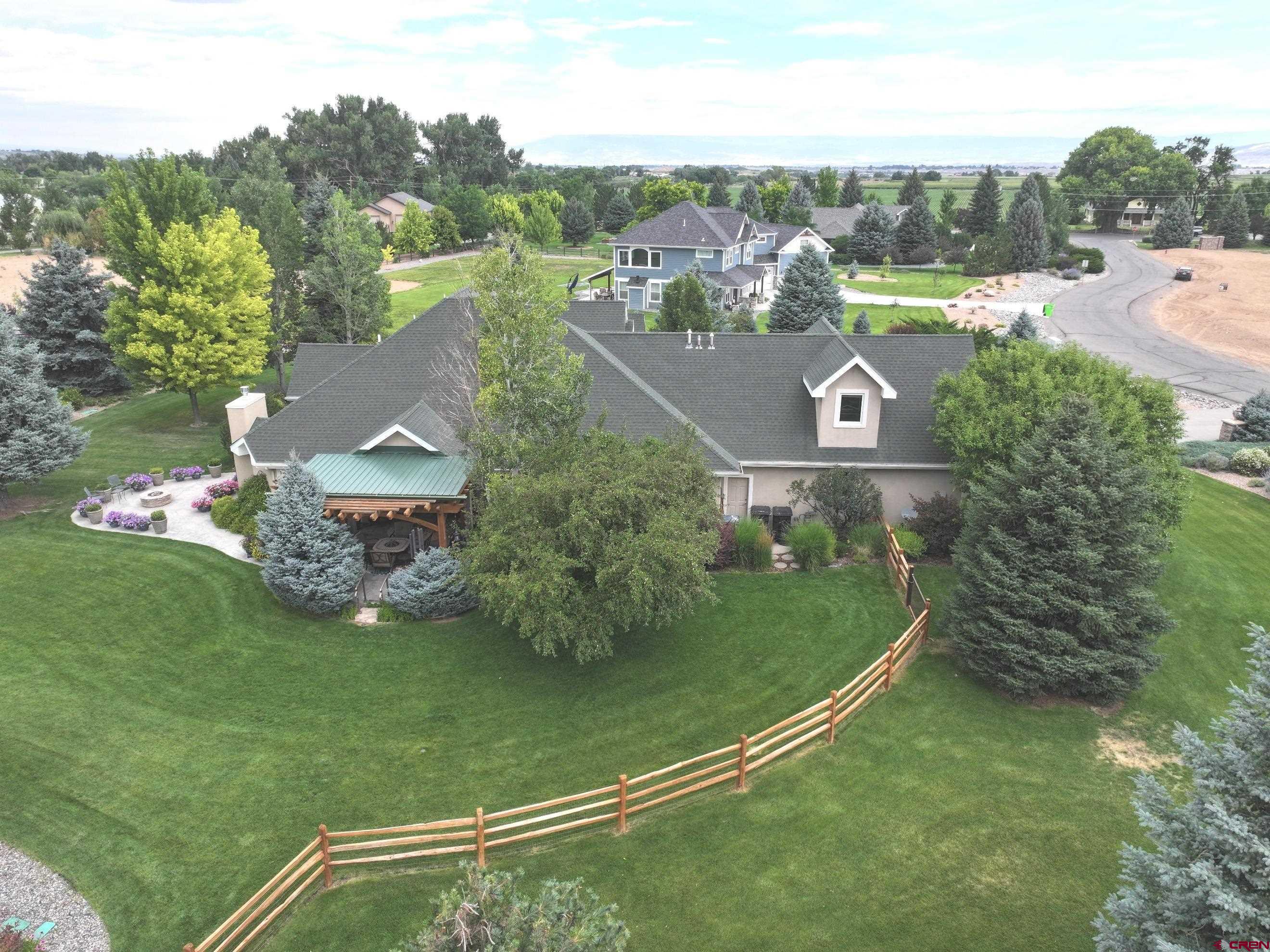 15103 6260th Road Montrose, CO 81403 - Photo 9 of 45 an aerial view of a house with a yard