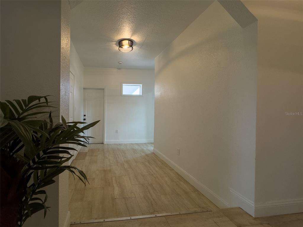 1047 Clay Boulevard Eustis, FL 32726 - Photo 20 of 33 a view of a livingroom with a pathway
