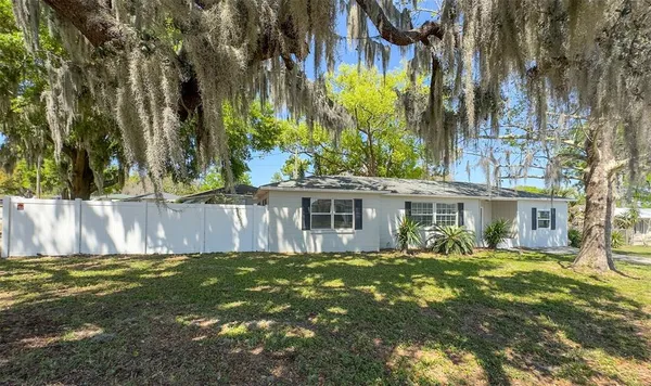 a view of a house with a big yard