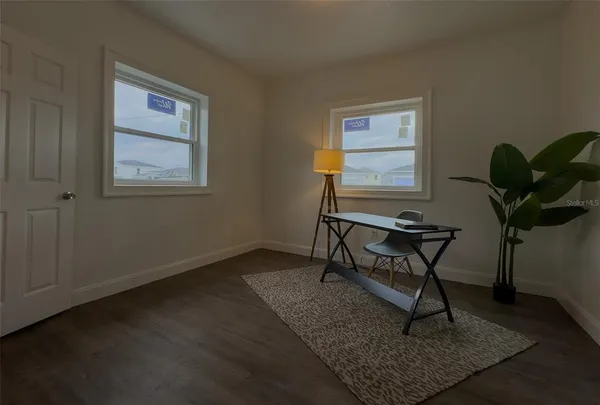 a bathroom with a toilet a sink and bathtub