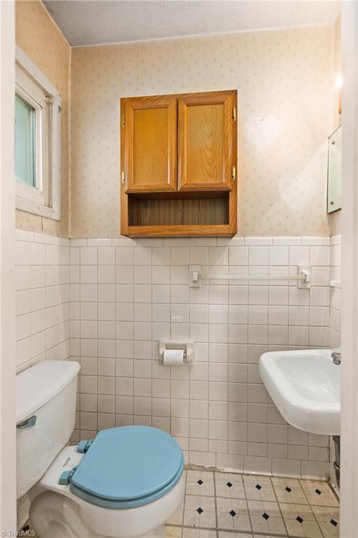 200 Maynard Drive Trinity, NC 27370 - Photo 19 of 33 Half bath in the primary bedroom