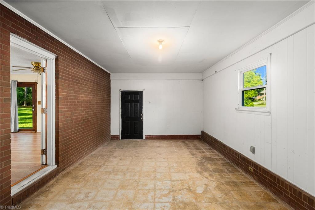 200 Maynard Drive Trinity, NC 27370 - Photo 23 of 33 Enclosed carport / bonus room with wood stove
