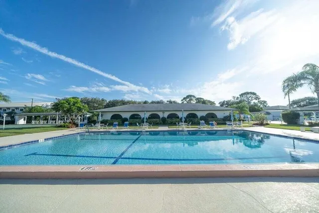 a view of pool and outdoor space