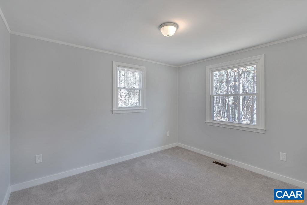 8073 Chestnut Grove Road Esmont, VA 22937 - Photo 19 of 30 an empty room with a window