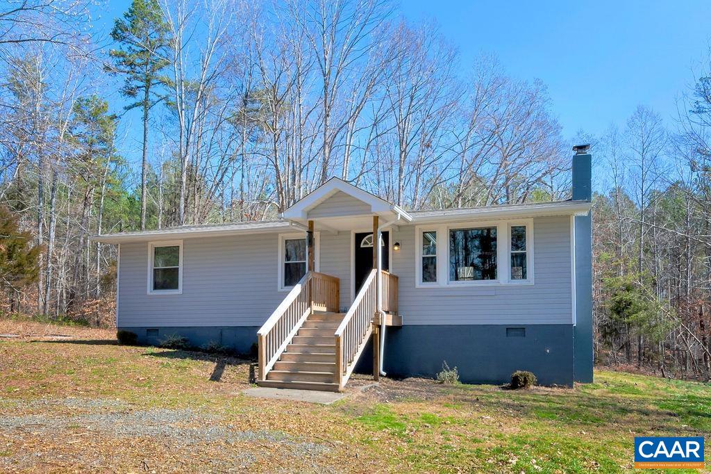 8073 Chestnut Grove Road Esmont, VA 22937 - Photo 2 of 30 a view of a house with a yard