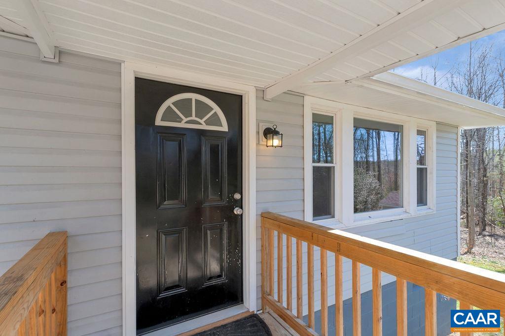 8073 Chestnut Grove Road Esmont, VA 22937 - Photo 3 of 30 a view of front door of house