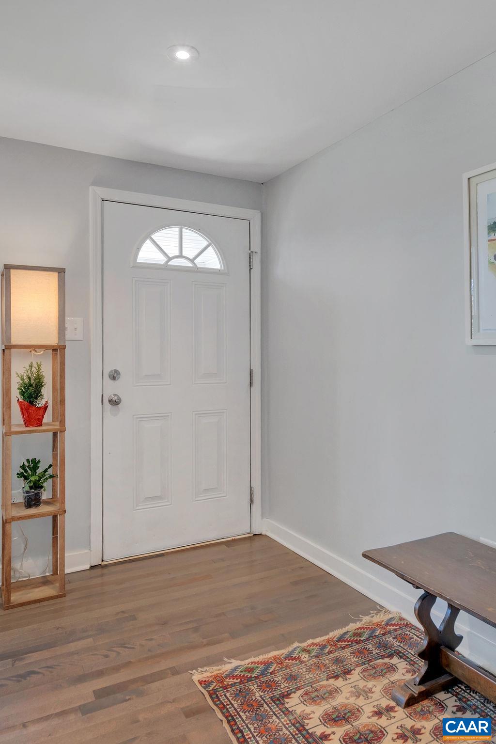 8073 Chestnut Grove Road Esmont, VA 22937 - Photo 5 of 30 a view of empty room with window and wooden floor