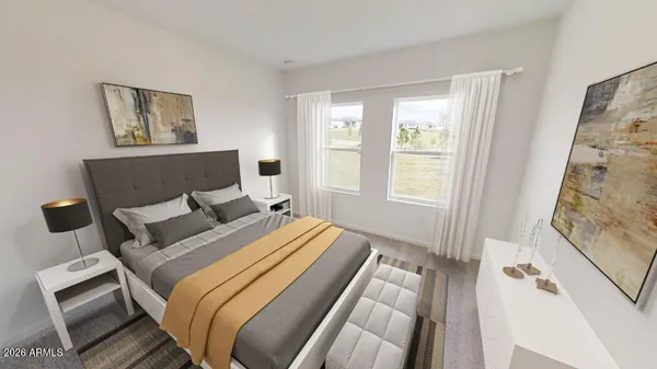 a bed sitting in a bedroom next to a window