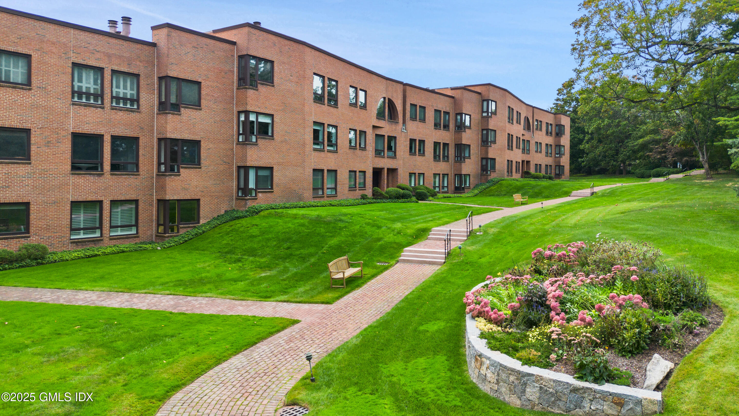 a large building with a garden