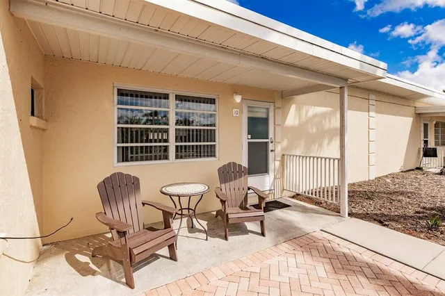 a building outdoor space with patio furniture