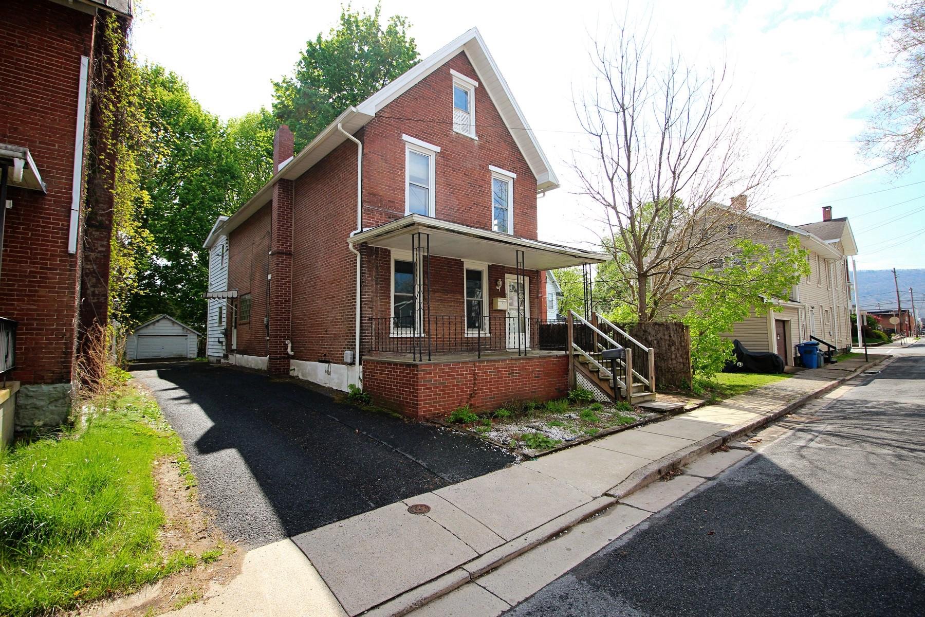 108 Mill Street Lock Haven, PA 17745 - Photo 2 of 26 a front view of a house with garden