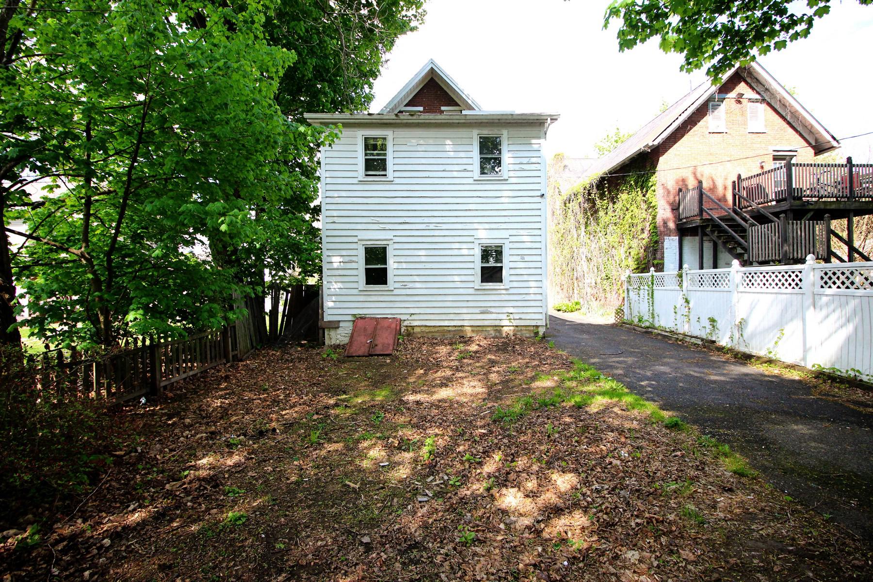 108 Mill Street Lock Haven, PA 17745 - Photo 4 of 26 a view of a house with a yard