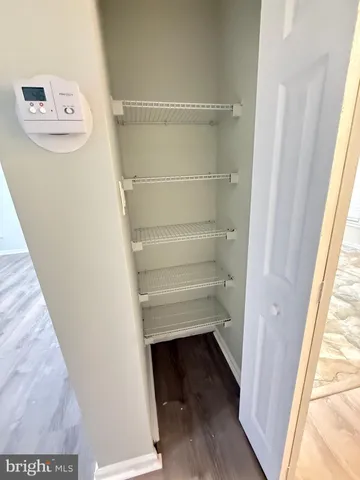 a view of entryway with wooden floor