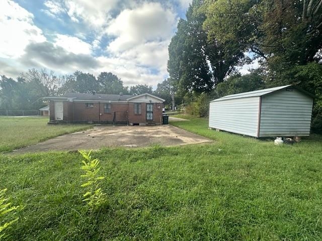 344 Dixie Road Memphis, TN 38109 - Photo 5 of 8 a view of a backyard with a garden