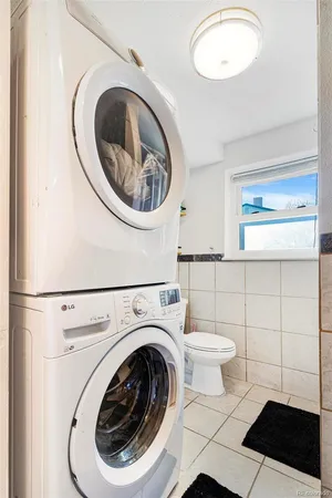 a bathroom with a toilet and a sink