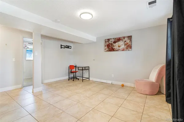 a bedroom with a bed and a cabinets
