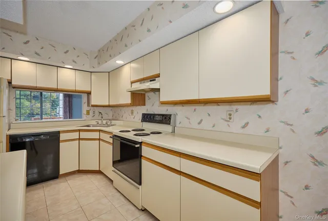 a bathroom with a toilet and shower