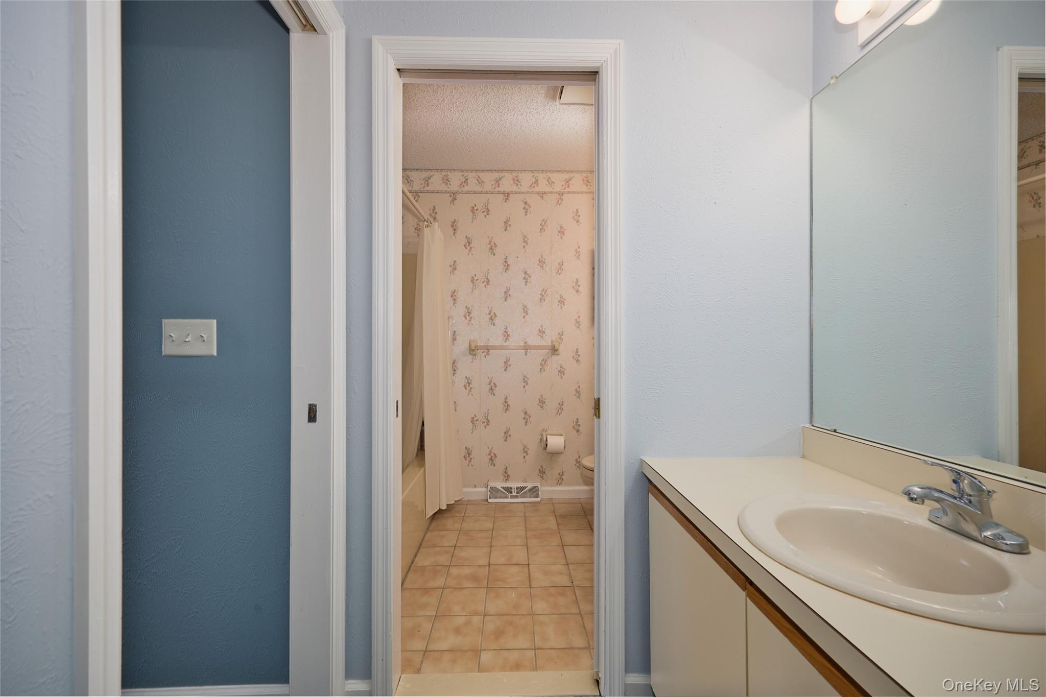 43 Spruce Ridge Drive Fishkill, NY 12524 - Photo 33 of 44 a bathroom with a sink and a mirror
