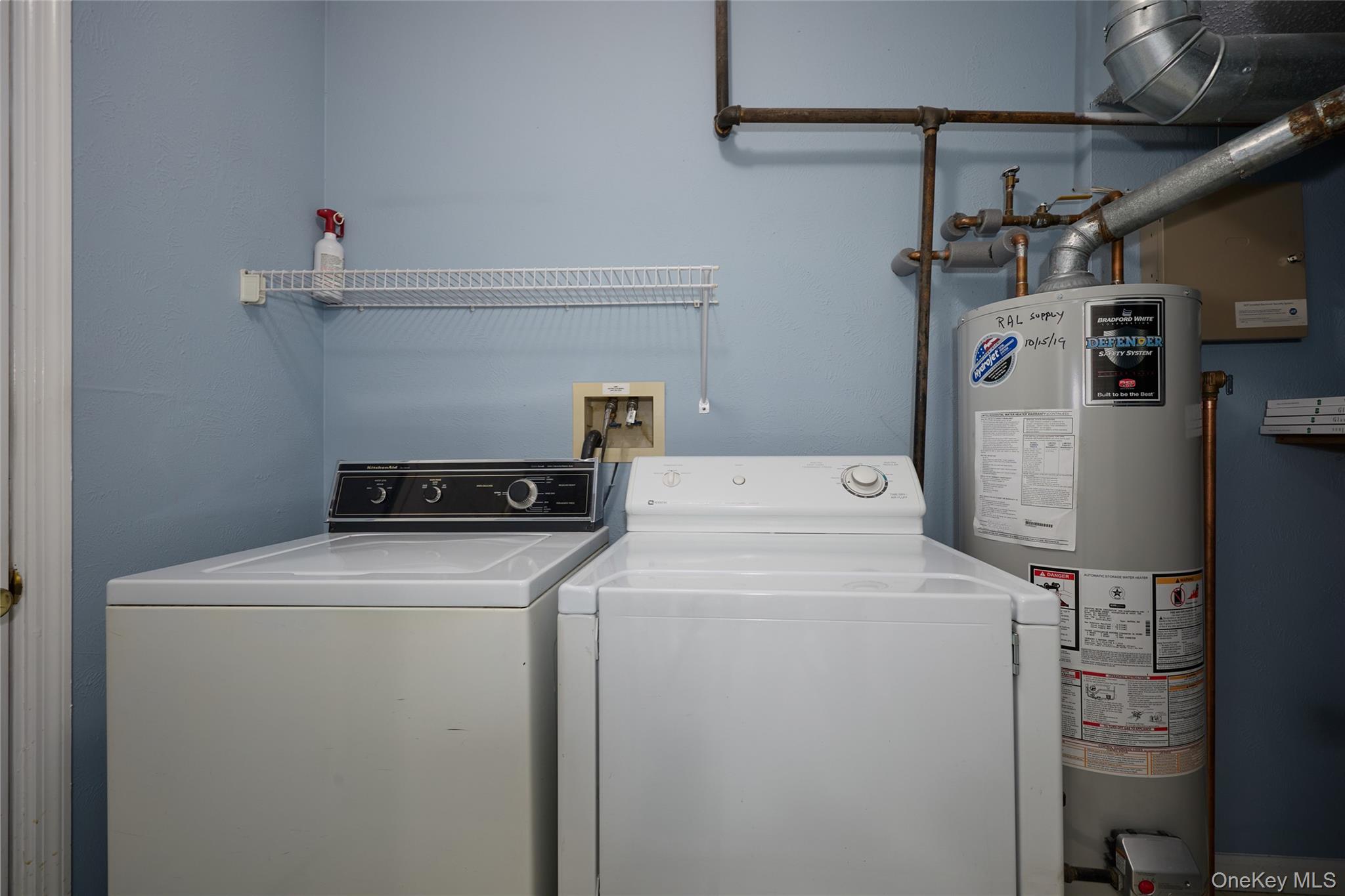 43 Spruce Ridge Drive Fishkill, NY 12524 - Photo 37 of 44 a utility room with dryer and washer