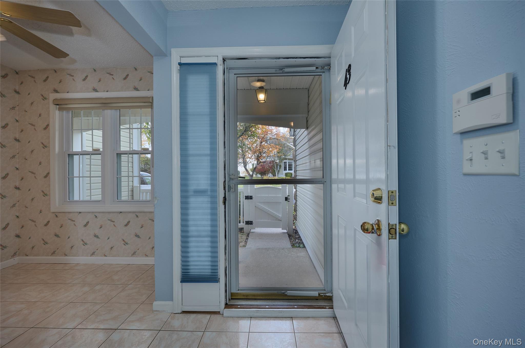 43 Spruce Ridge Drive Fishkill, NY 12524 - Photo 6 of 44 a bathroom with a glass shower door and mirror