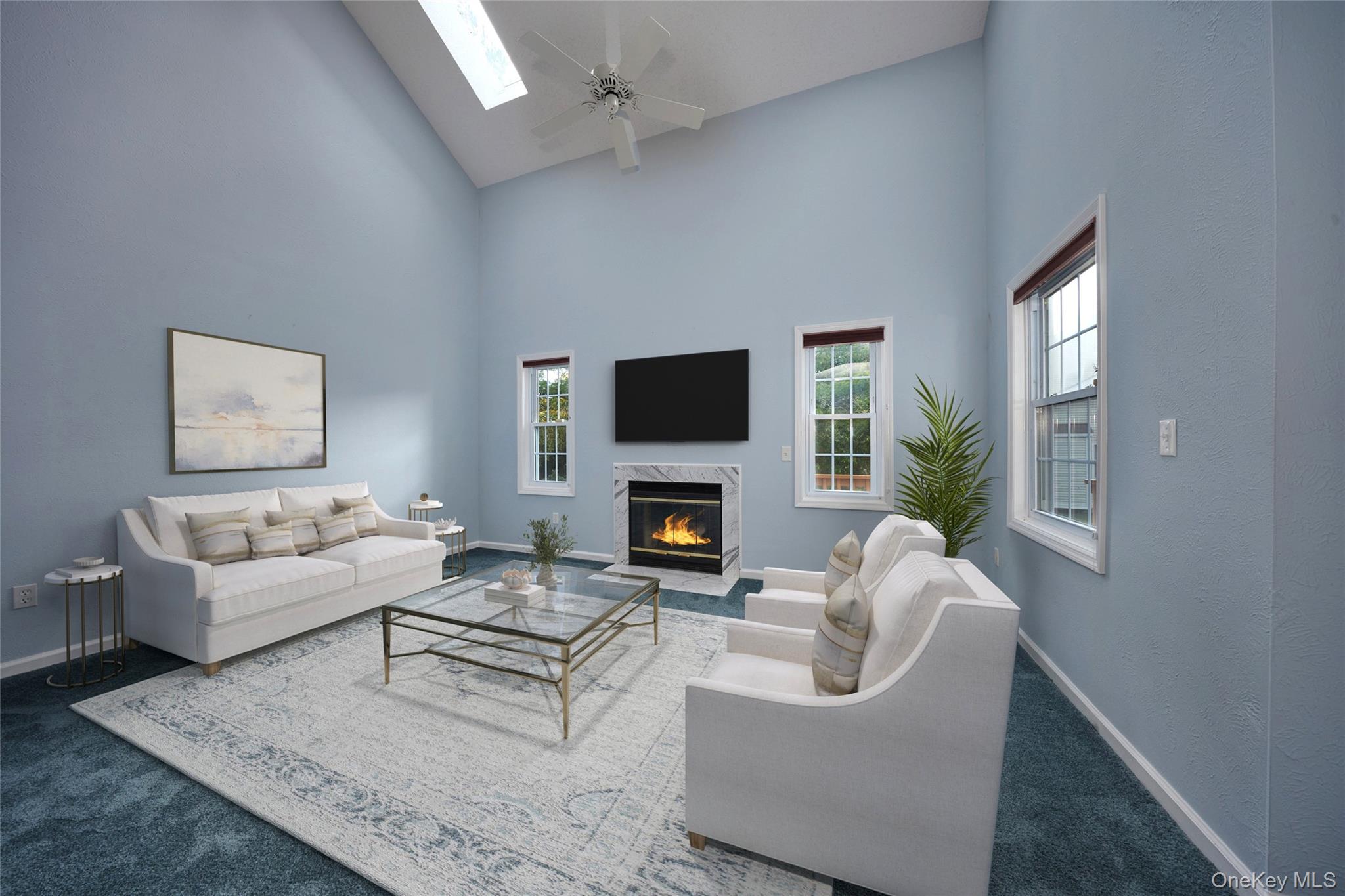 43 Spruce Ridge Drive Fishkill, NY 12524 - Photo 8 of 44 a living room with furniture a fireplace and a flat screen tv