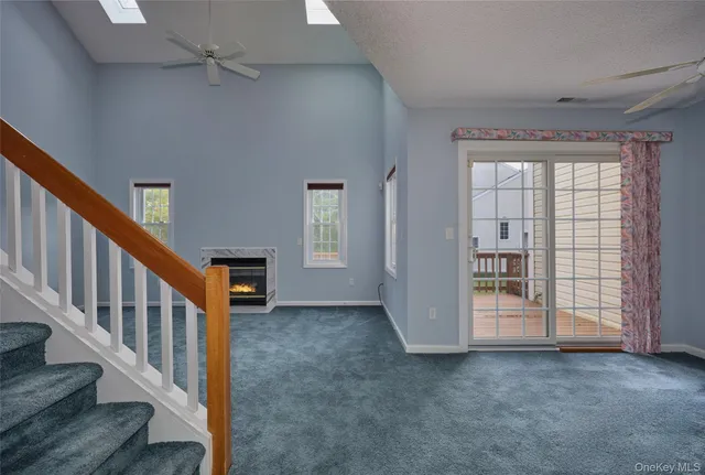 a kitchen with a stove sink and cabinets