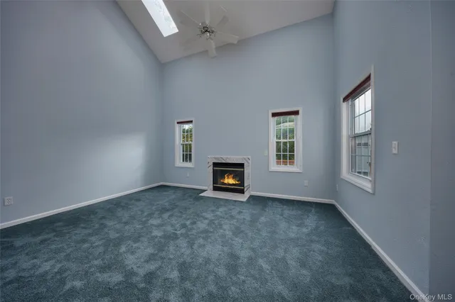 a kitchen with a sink a refrigerator and window
