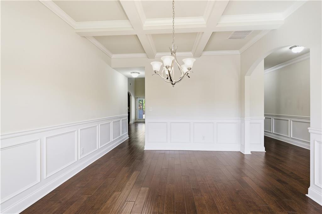 2573 Madison Mae Lane Grayson, GA 30017 - Photo 12 of 51 wooden floor in an empty room with a window