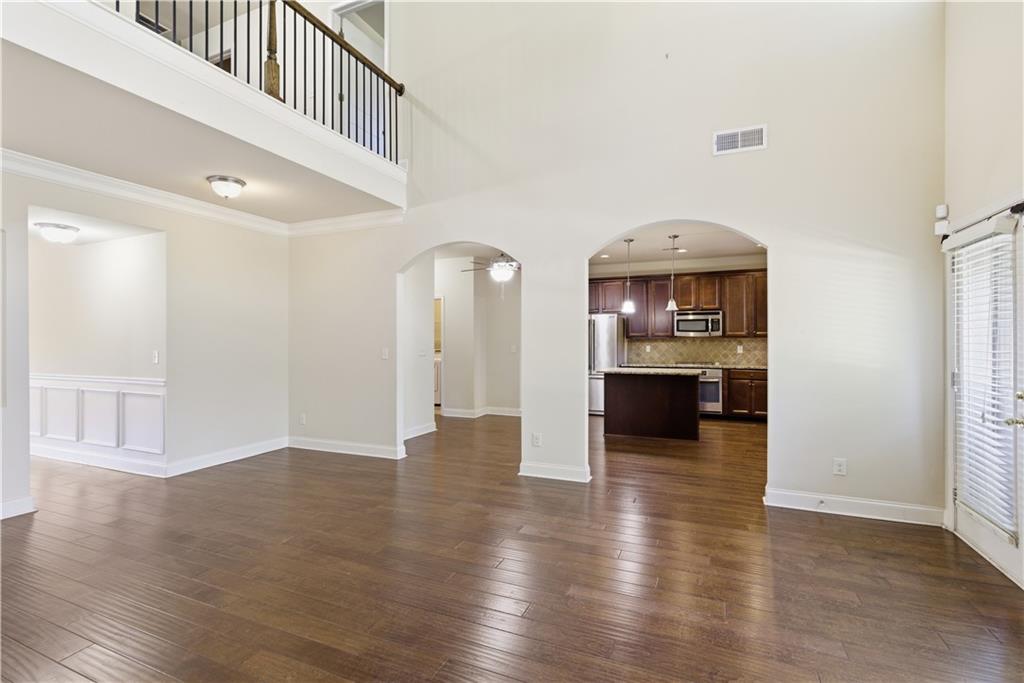 2573 Madison Mae Lane Grayson, GA 30017 - Photo 16 of 51 a view of a kitchen with a sink and a stove top oven
