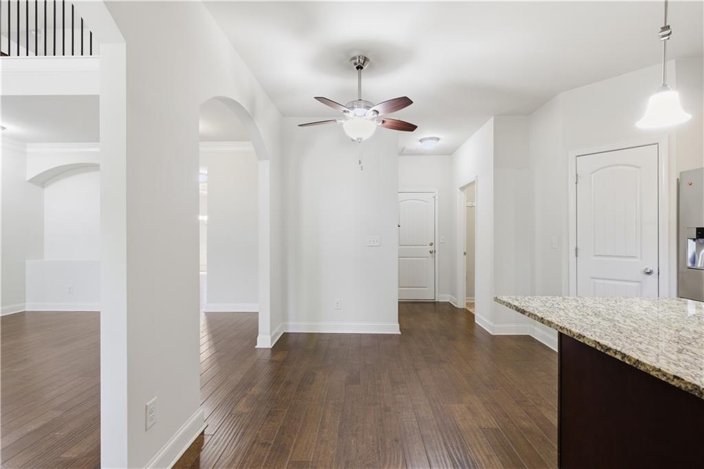 2573 Madison Mae Lane Grayson, GA 30017 - Photo 22 of 51 wooden floor in an empty room with a window
