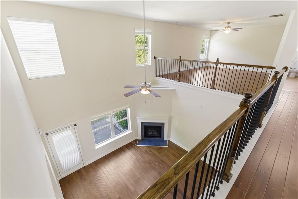 2573 Madison Mae Lane Grayson, GA 30017 - Photo 34 of 51 a view of an entryway wooden floor and staircase