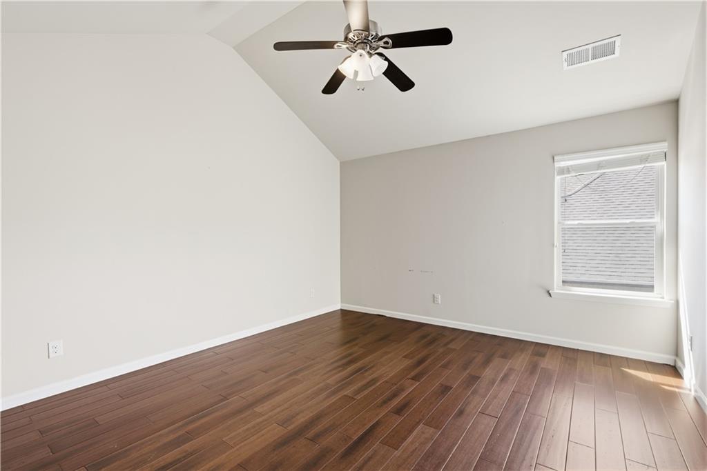 2573 Madison Mae Lane Grayson, GA 30017 - Photo 40 of 51 wooden floor in an empty room with a window