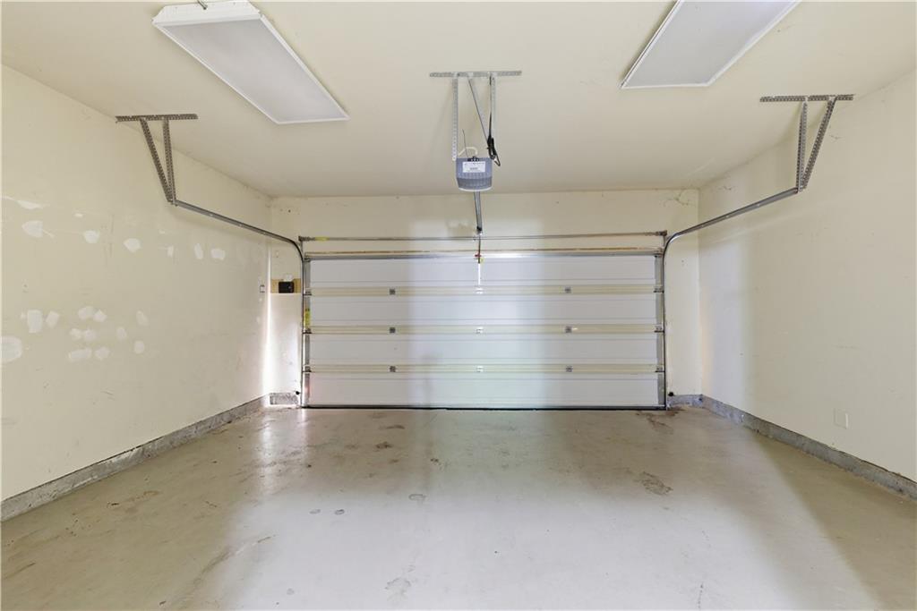 2573 Madison Mae Lane Grayson, GA 30017 - Photo 46 of 51 a view of a garage