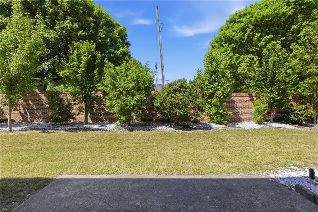 2573 Madison Mae Lane Grayson, GA 30017 - Photo 47 of 51 a view of a yard with an outdoor space