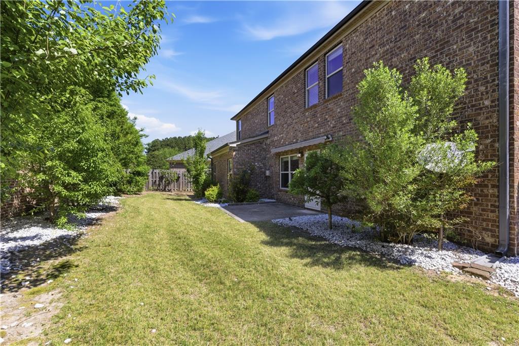 2573 Madison Mae Lane Grayson, GA 30017 - Photo 48 of 51 a view of a yard in front of house