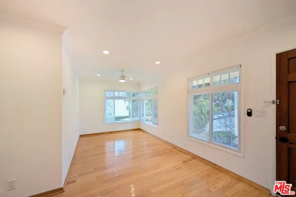 a view of an empty room and window
