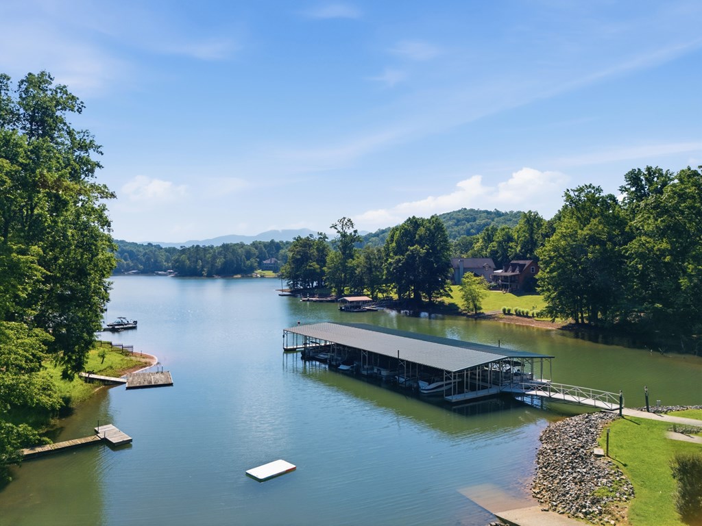 2143 Ridgecrest Circle, Unit 1 Hiawassee, GA 30546 - Photo 19 of 53 an aerial view of a house with swimming pool lake view and boat in the back