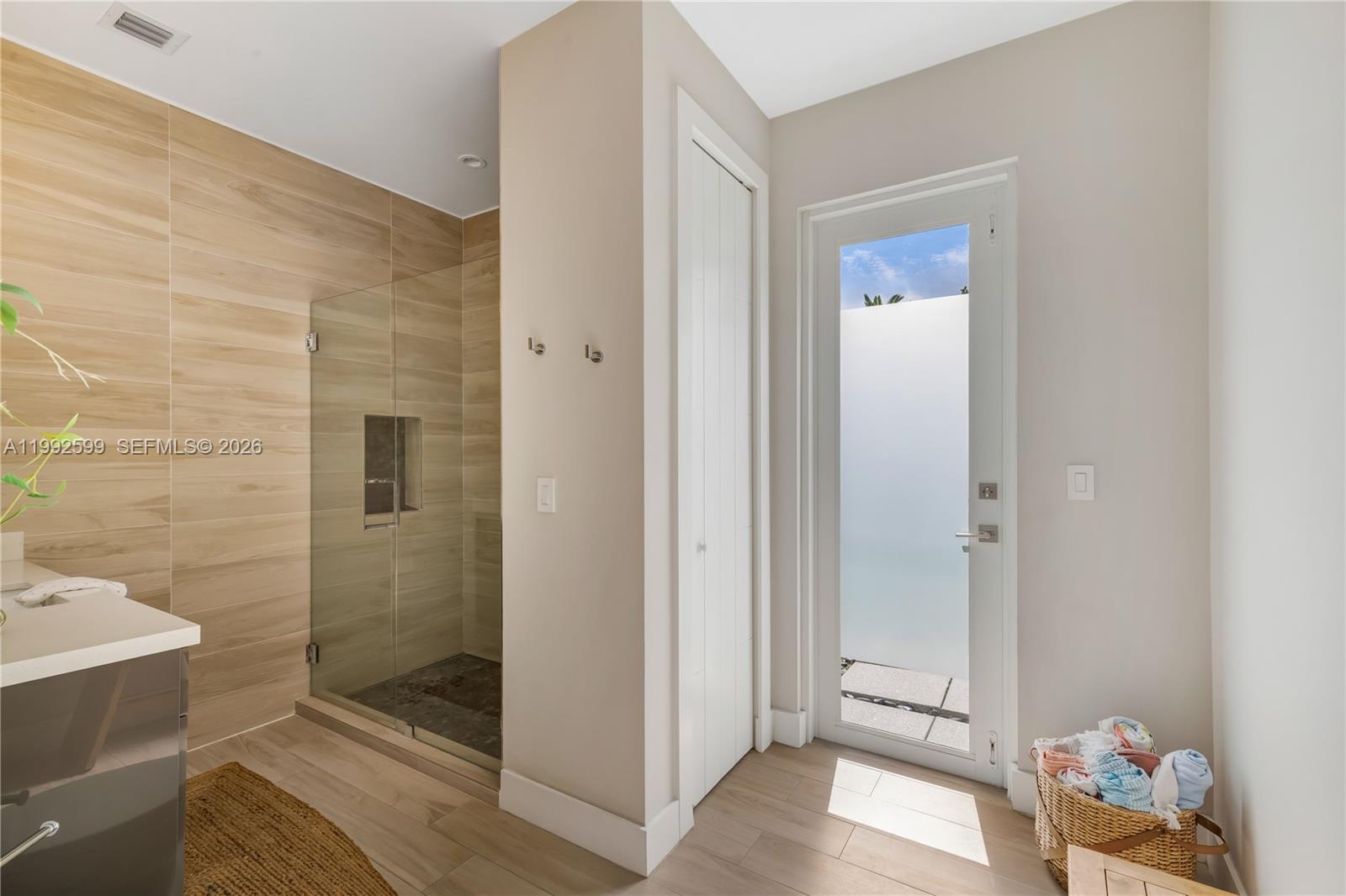 5602 Southwest 65th Court South Miami, FL 33143 - Photo 20 of 68 a bathroom with a shower and a toilet