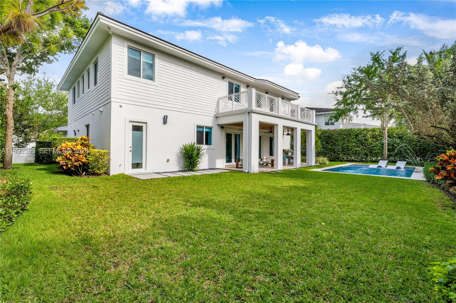 5602 Southwest 65th Court South Miami, FL 33143 - Photo 36 of 68 a front view of house with yard and green space