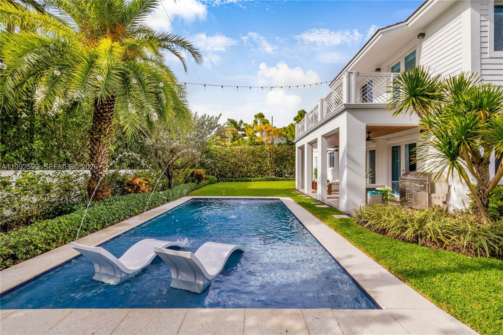 5602 Southwest 65th Court South Miami, FL 33143 - Photo 37 of 68 a view of an house with swimming pool yard and patio