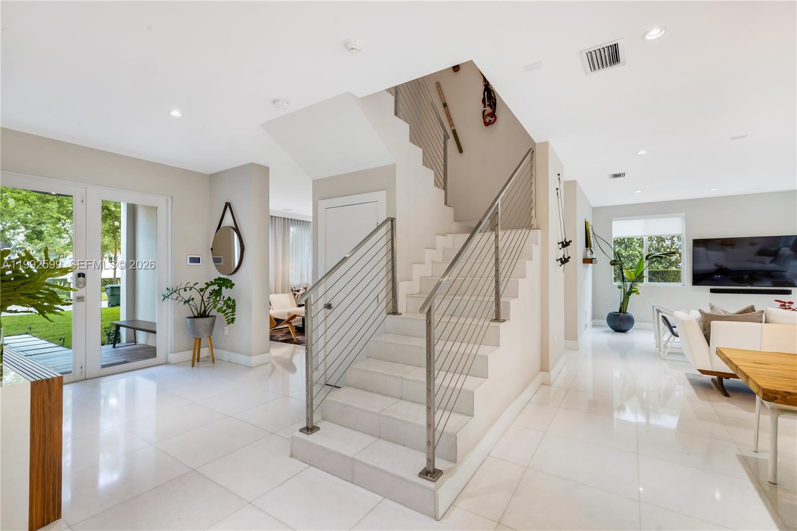 5602 Southwest 65th Court South Miami, FL 33143 - Photo 4 of 68 a view of entryway and livingroom with furniture