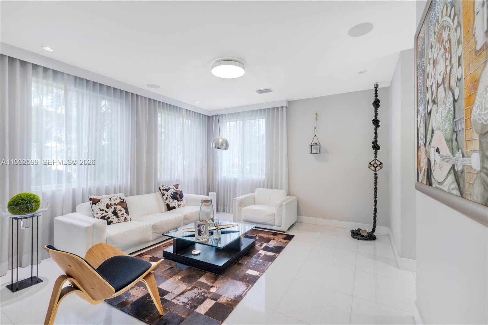 5602 Southwest 65th Court South Miami, FL 33143 - Photo 5 of 68 a living room with furniture and wooden floor