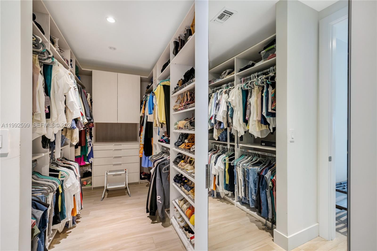 5602 Southwest 65th Court South Miami, FL 33143 - Photo 58 of 68 a view of walk in closet with clothes