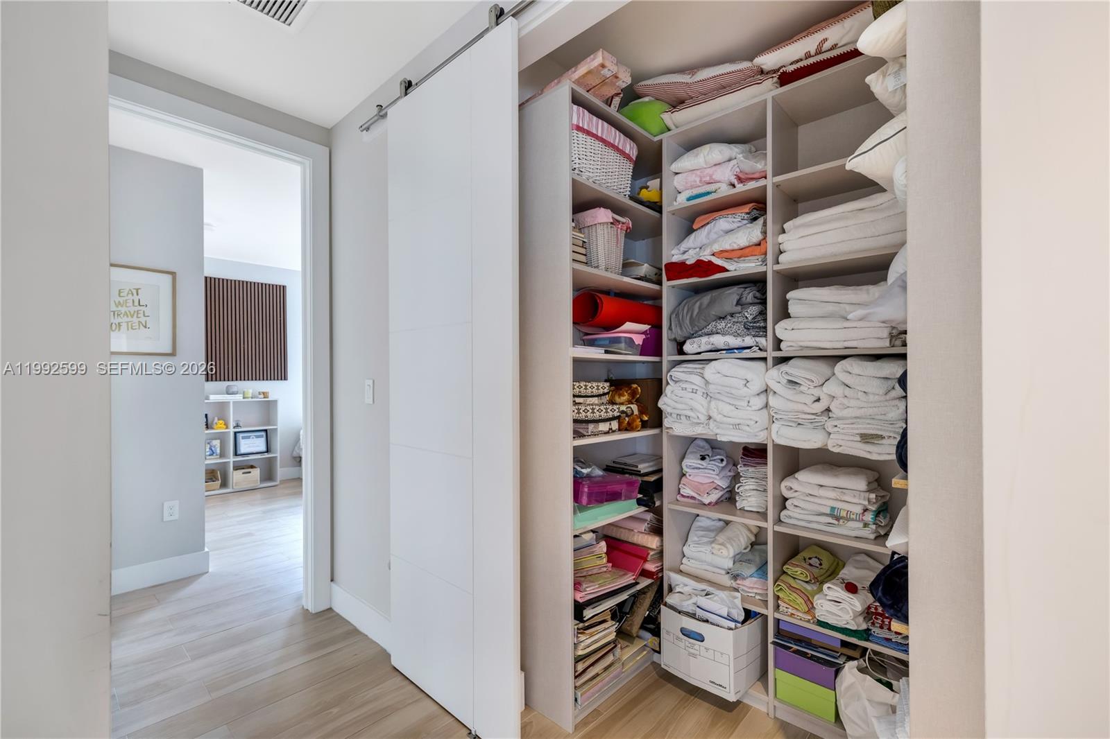 5602 Southwest 65th Court South Miami, FL 33143 - Photo 59 of 68 a view of walk in closet with clothes and shoes