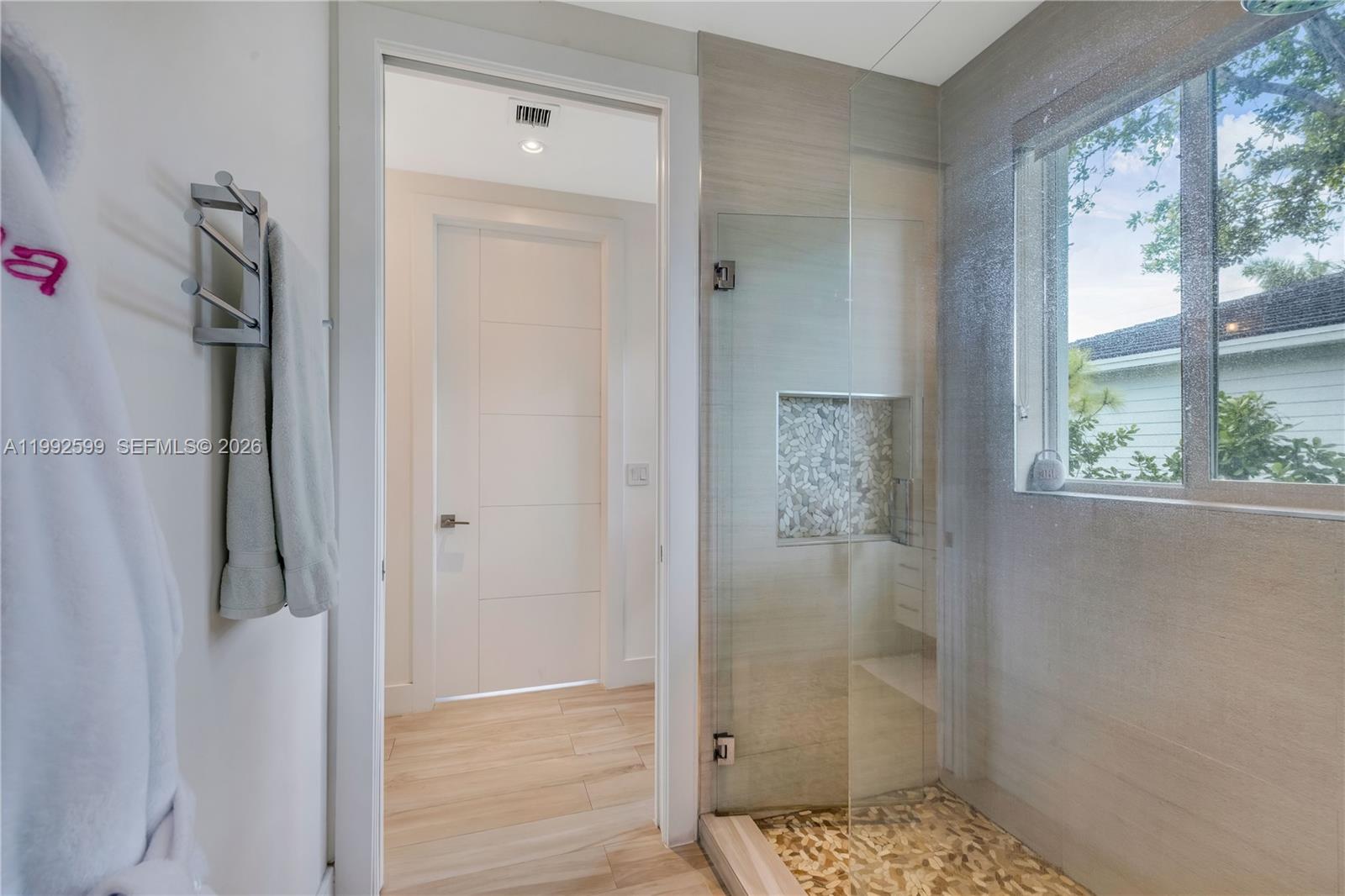 5602 Southwest 65th Court South Miami, FL 33143 - Photo 60 of 68 a bathroom with a shower