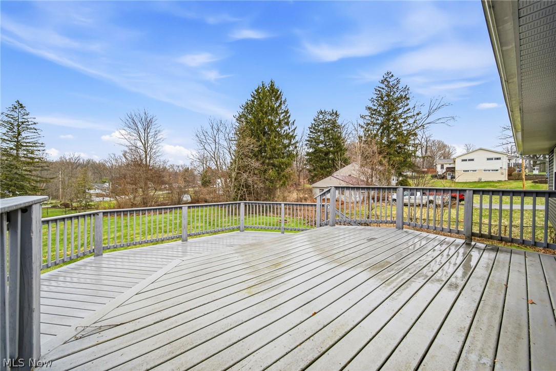 10397 Prouty Road Painesville, OH 44077 - Photo 26 of 32 Deck with a yard