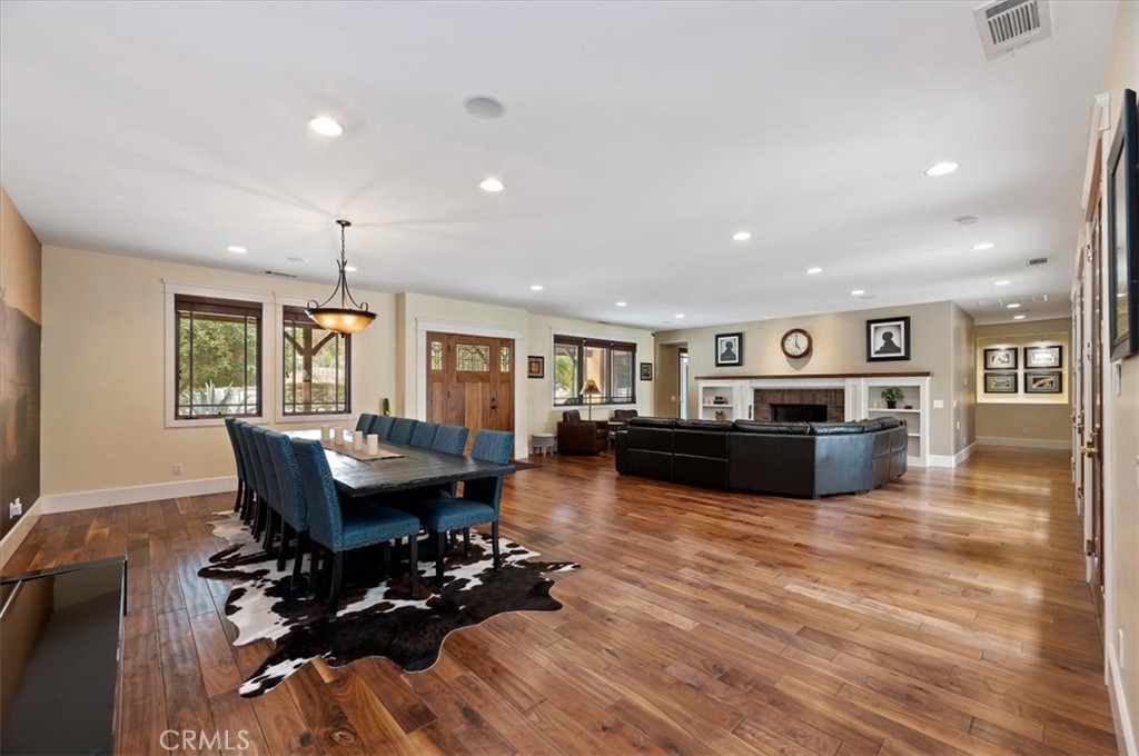 16420 Rocky Glen Road Perris, CA 92570 - Photo 14 of 74 a living room with furniture and wooden floor