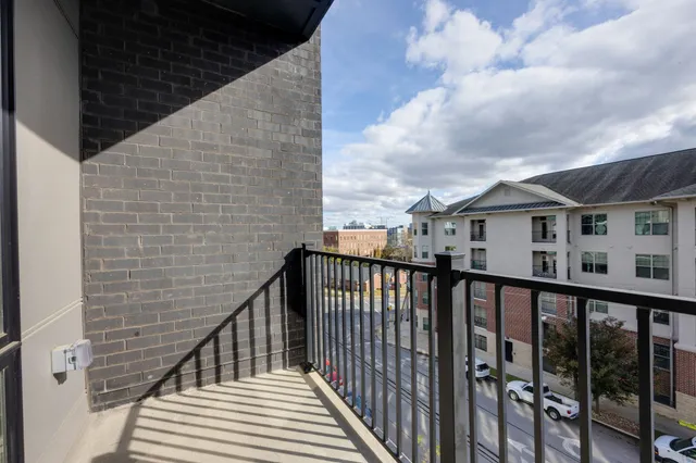 a kitchen with a dining table and chairs