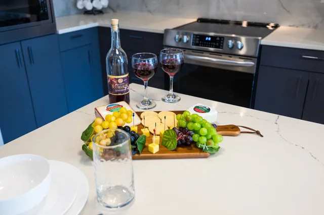 a view of hallway with wooden floor and stairs